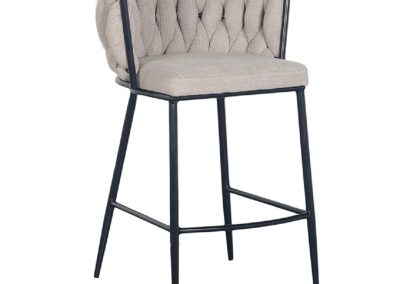 Lower height beige bar stool.